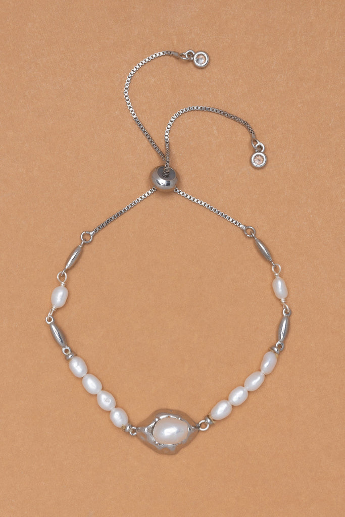 White Pearl Rhodium Pull Ball Bracelet - Nakamol