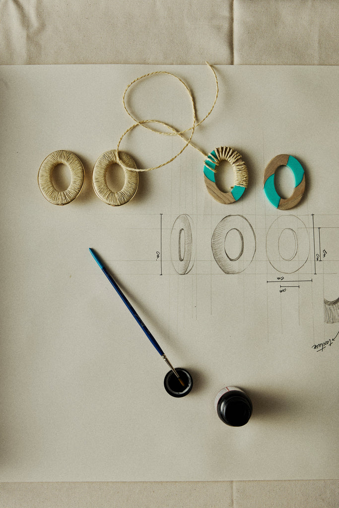 CREAM TEXTURED HOLLOW OVAL EARRINGS - Nakamol