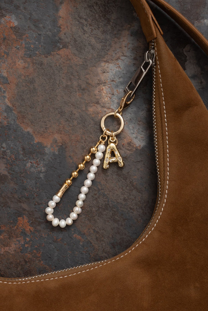 A Gold White Elegant Keychain - Nakamol