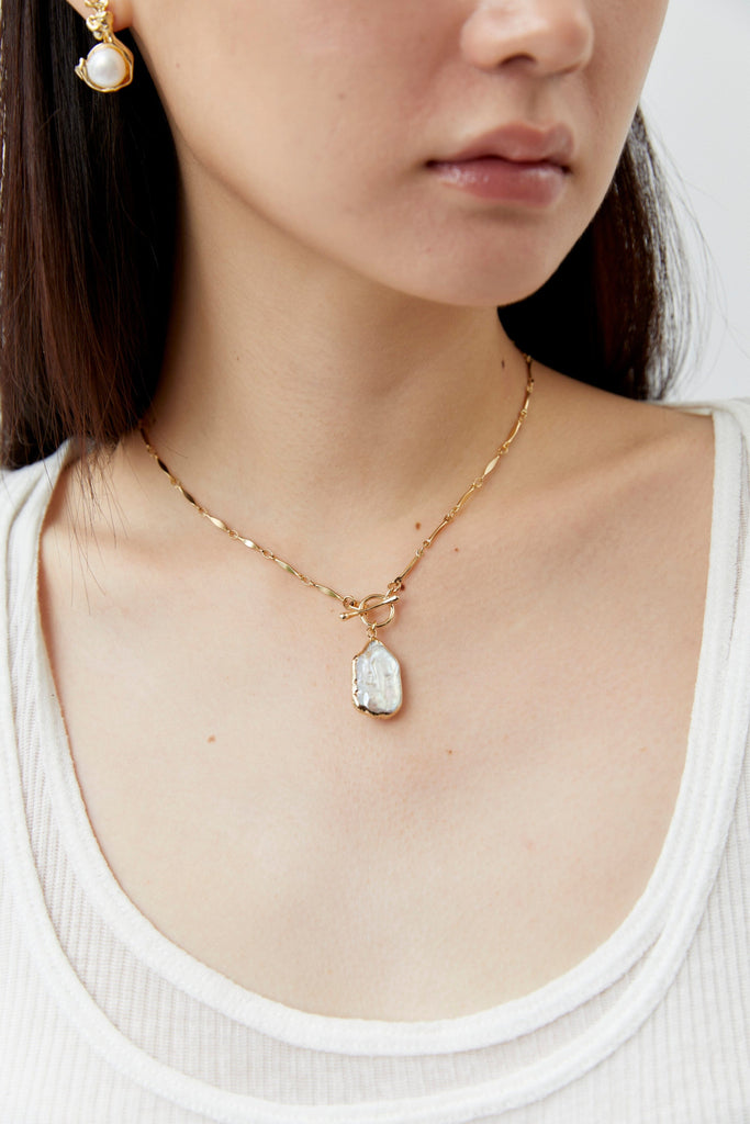 White Pearl Gold Cradle Earrings - Nakamol